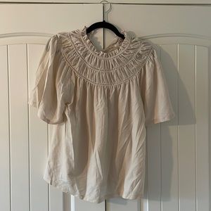 Ann Taylor size M beige blouse with flowing sleeves and cutout detailing